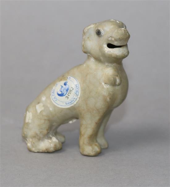 An early 18th century Chinese porcelain figure of a dog